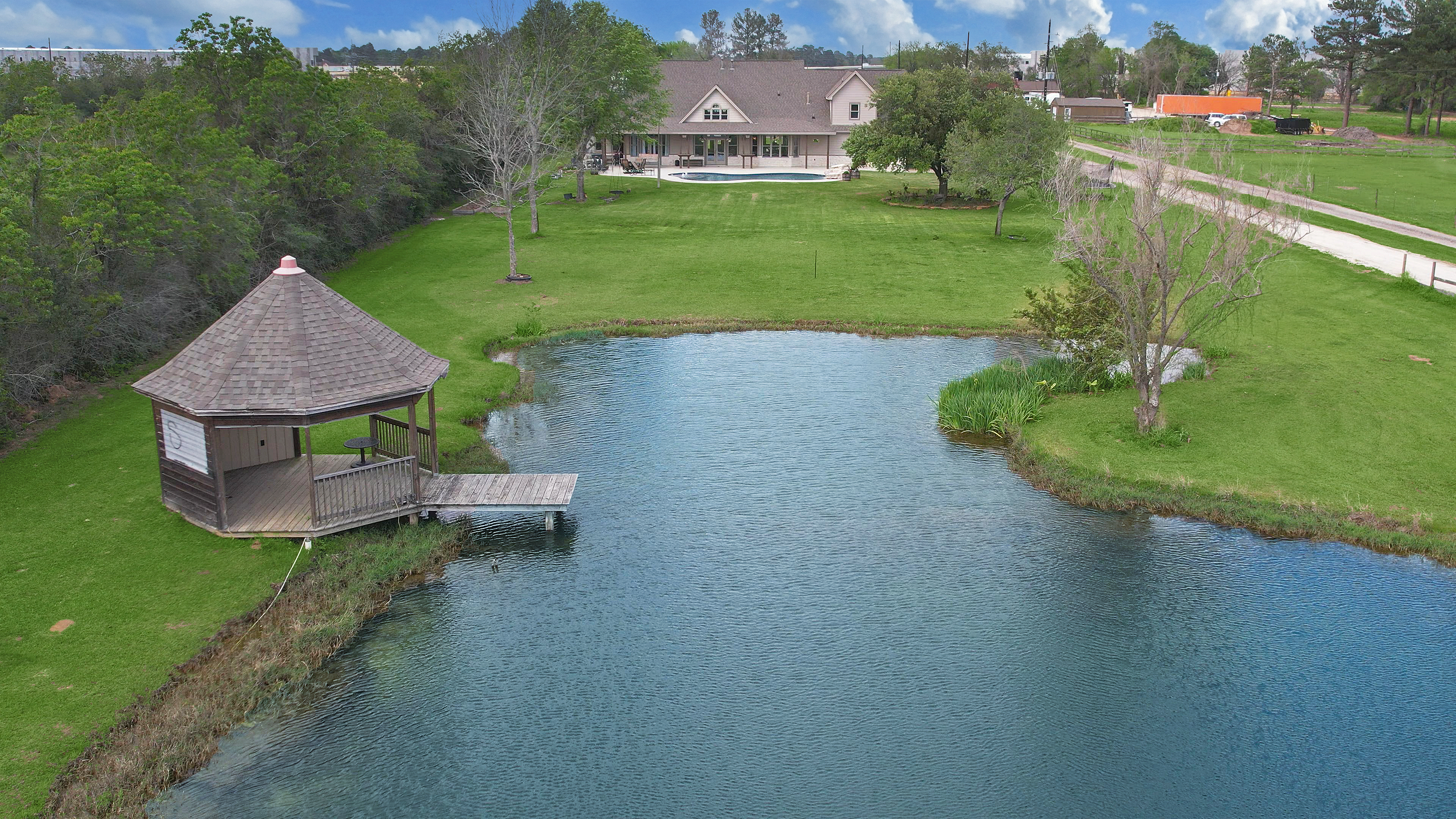 3 Acres with barn/warehouse and luxury home in  Tomball Tx