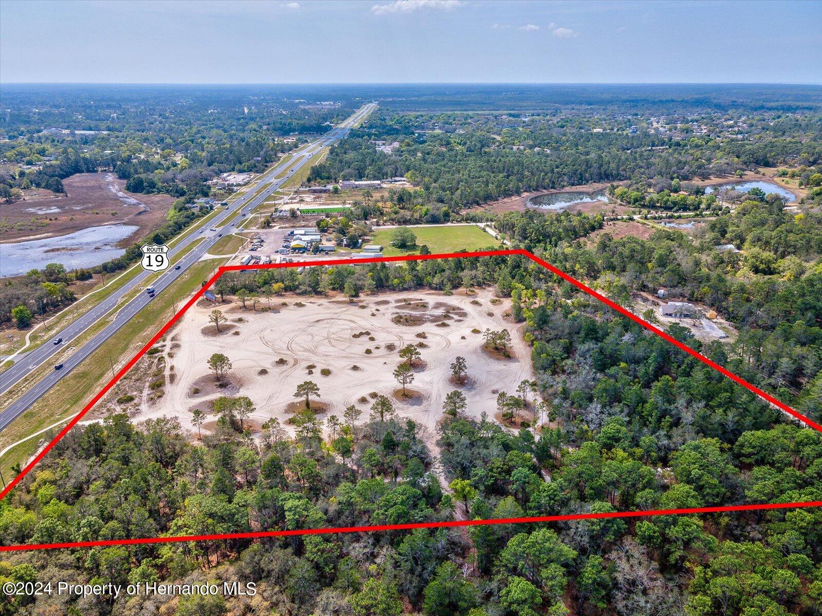 15.7 Acres Commercial Way