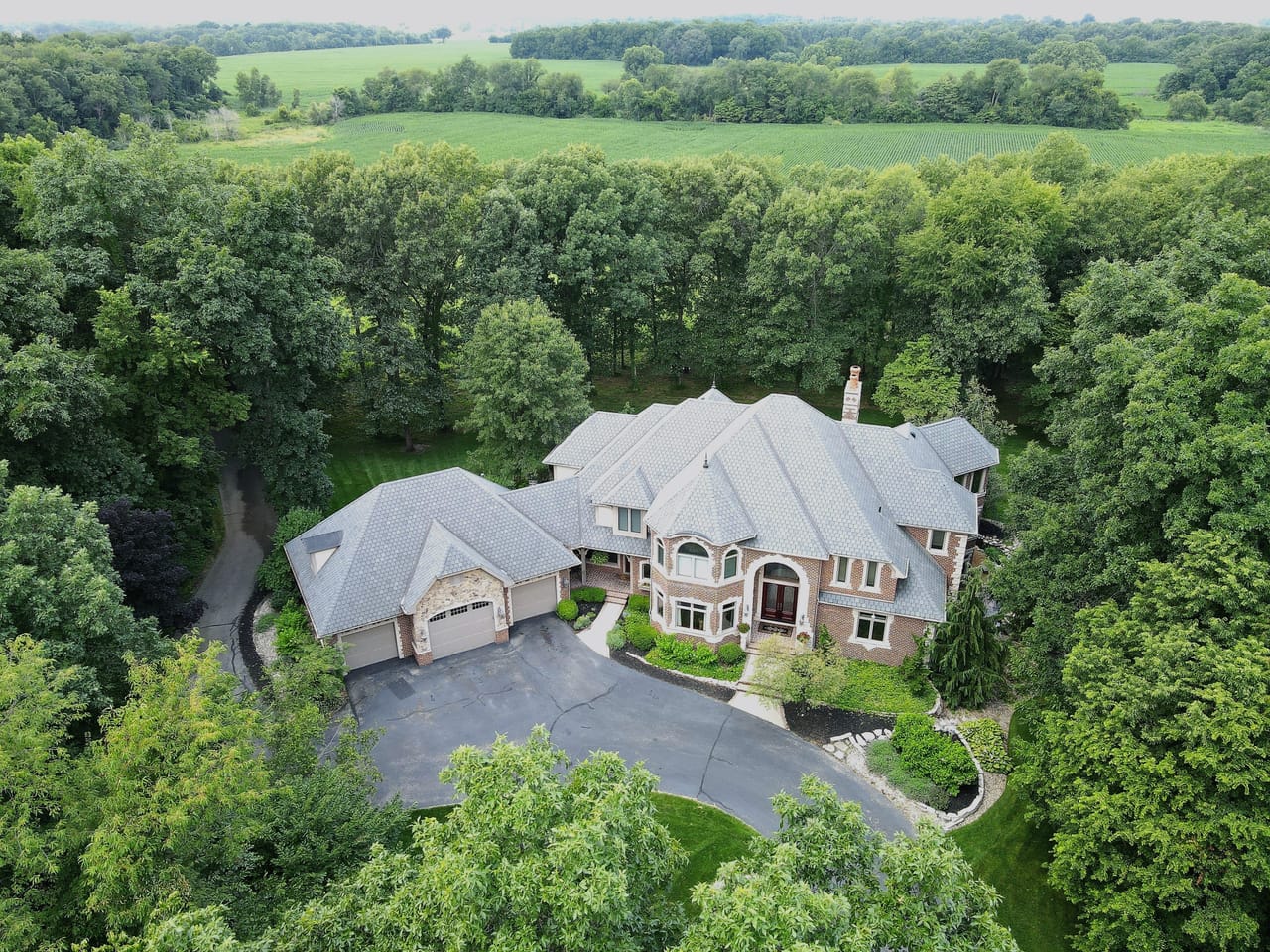 26201 Madison Rd North Liberty, IN 46530 / 20 +/- acres / 8,687 Sq Ft 7 Beds, 4.5 Bath / Pool House/Pool / Pond / Land for Sale