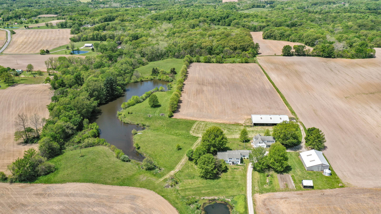 40+/ acres, 2 homes, ponds, and more!